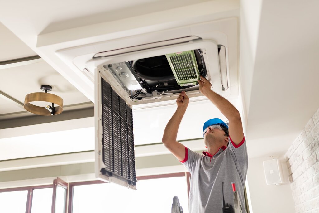 Air conditioner and suspended ceiling