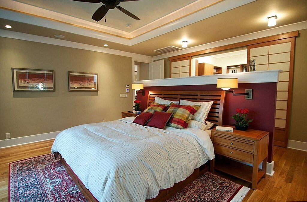 The air conditioner above the bed in the bedroom