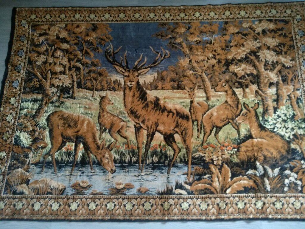 A rug with deer