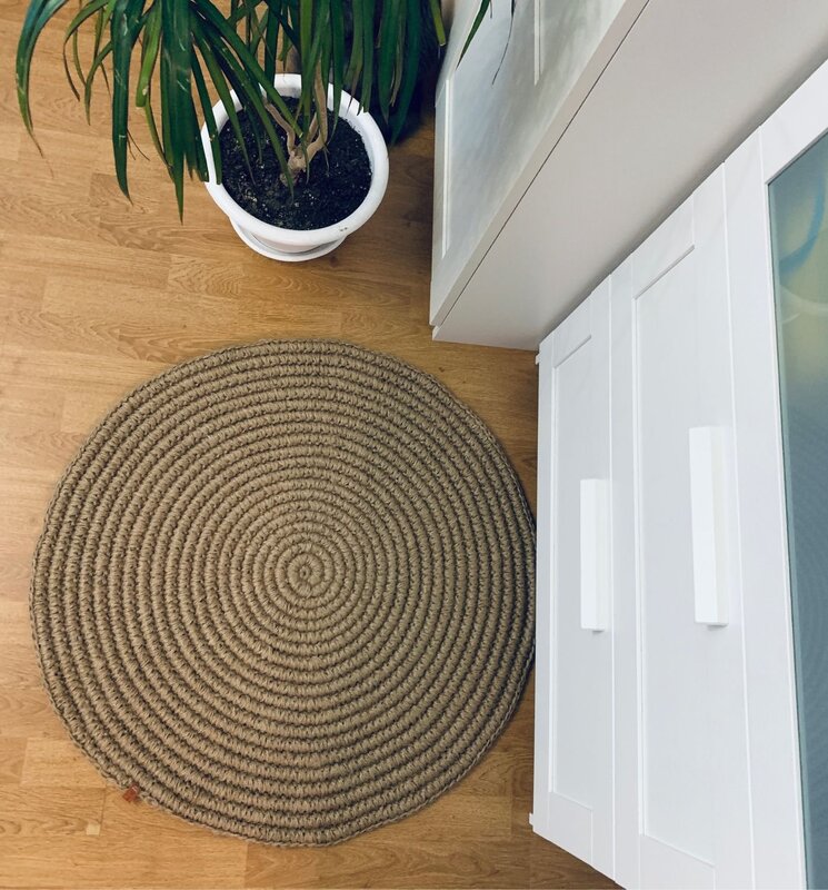 A rug made of jute rope