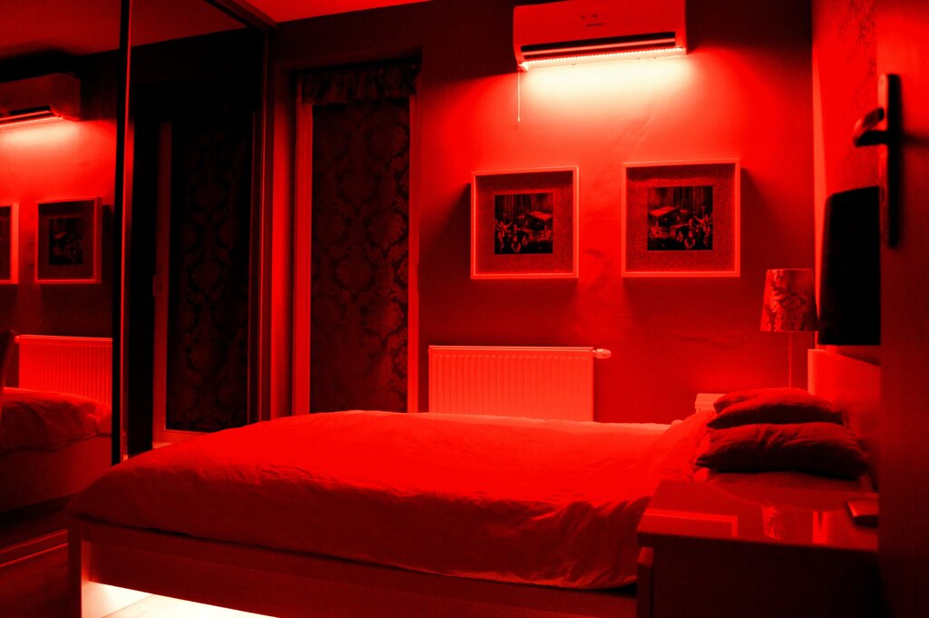 Red lighting in the bedroom