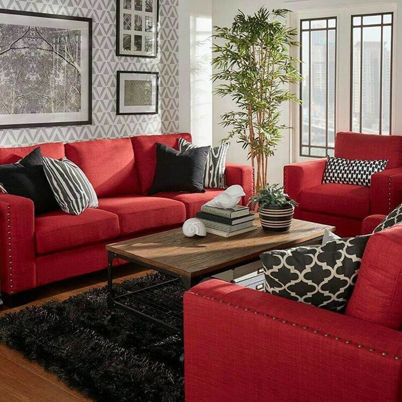 A red sofa in the living room interior