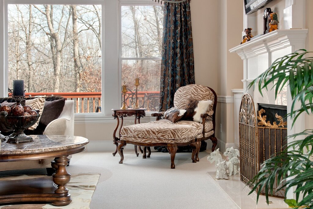 An armchair by the window in the interior