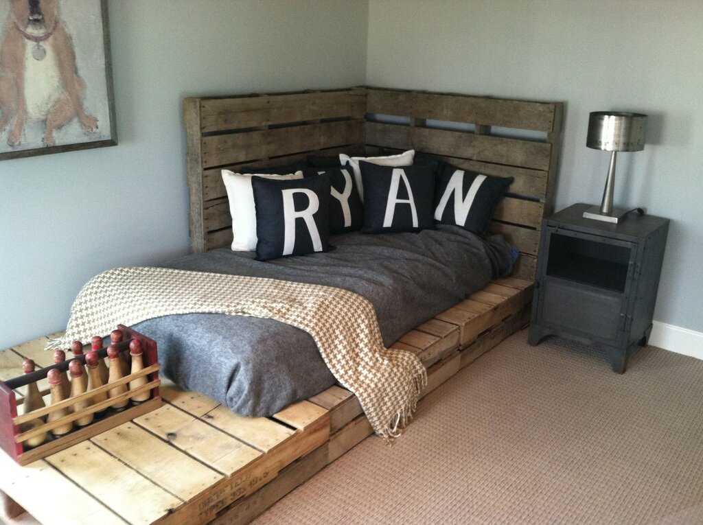 A bed made of pallets with lighting 33 фото