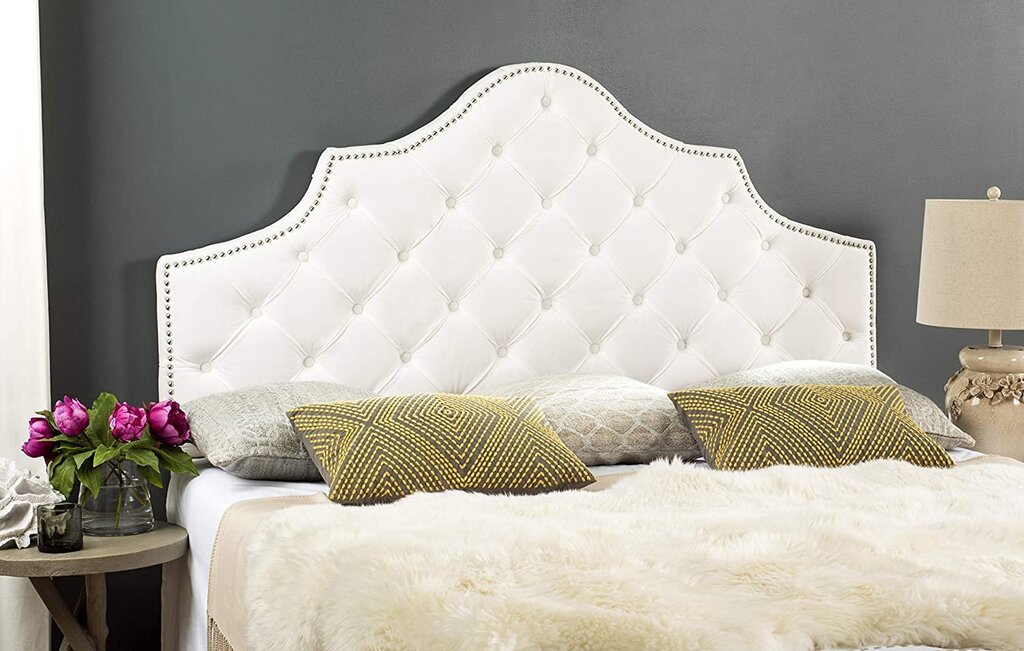 Bed with a velvet headboard