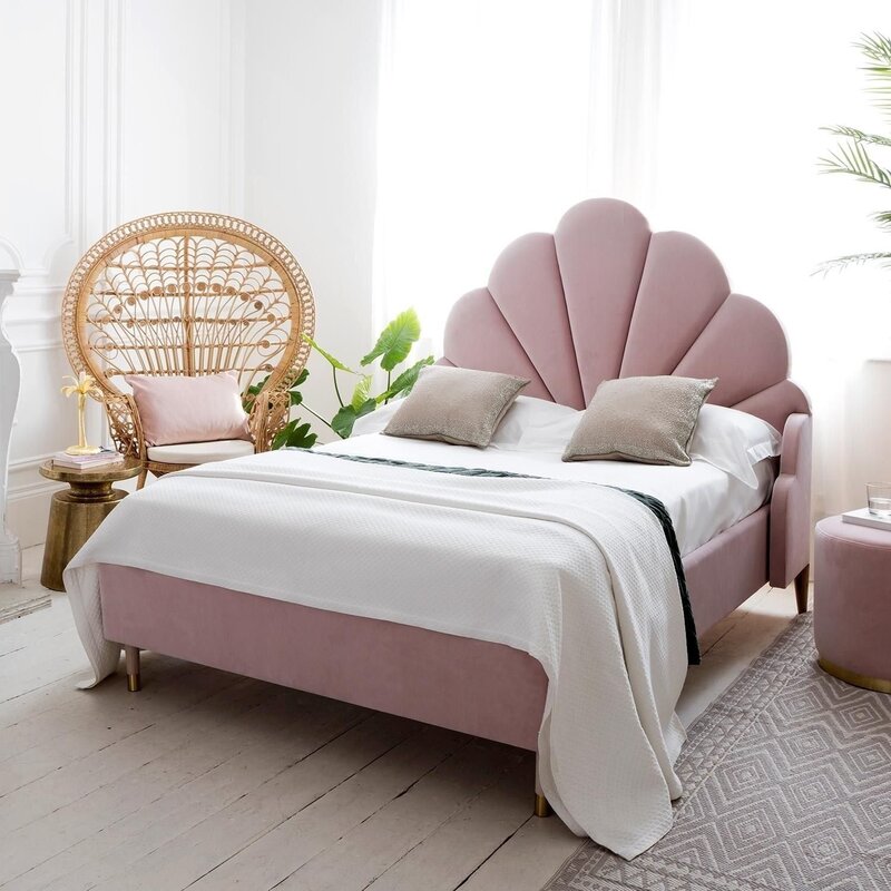 Bed with a round headboard