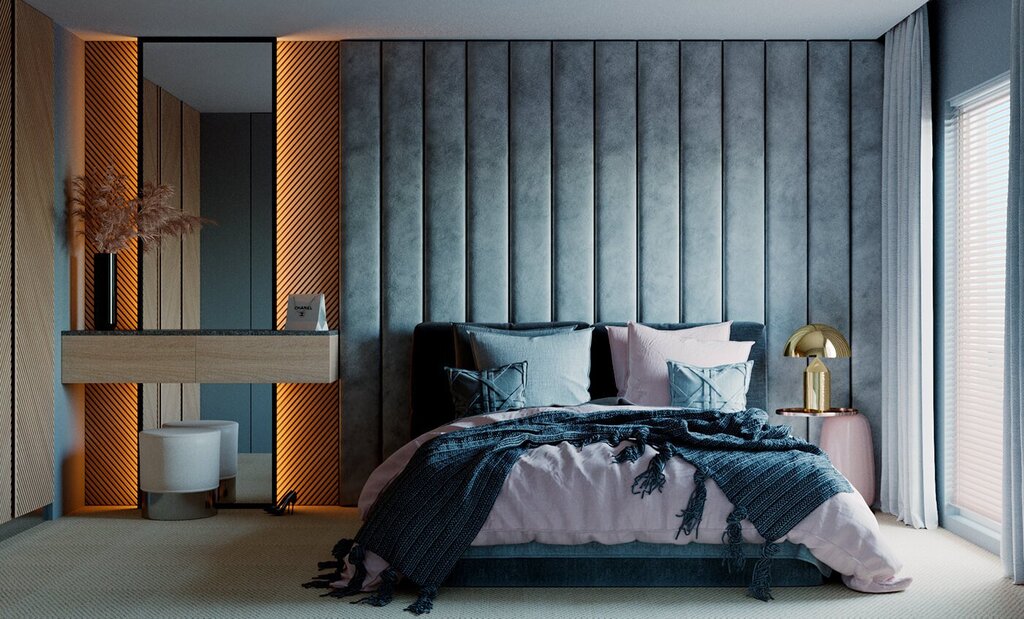 Bed with a soft wall panel