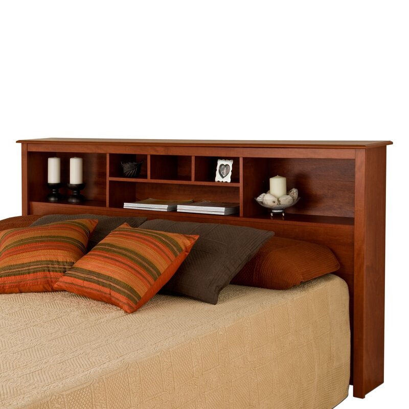 Bed with a shelf in the headboard