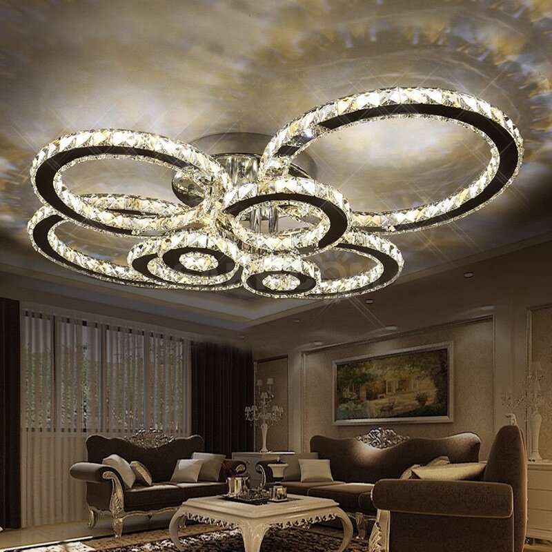 Round chandeliers on a stretch ceiling