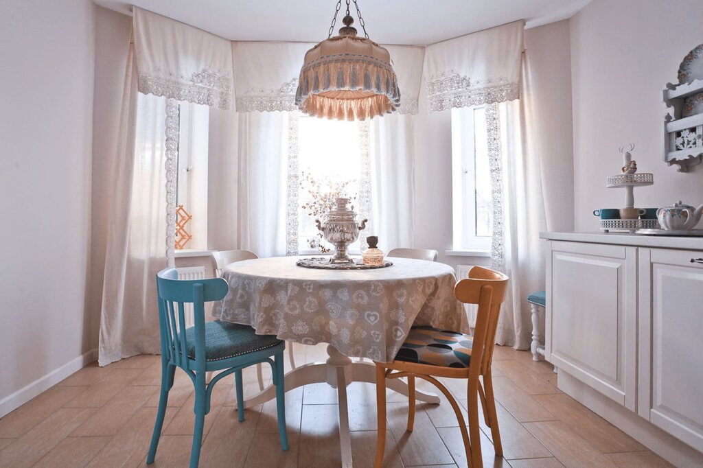 A round table by the wall in the kitchen