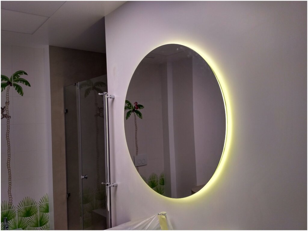 Round mirror with lighting for the bathroom