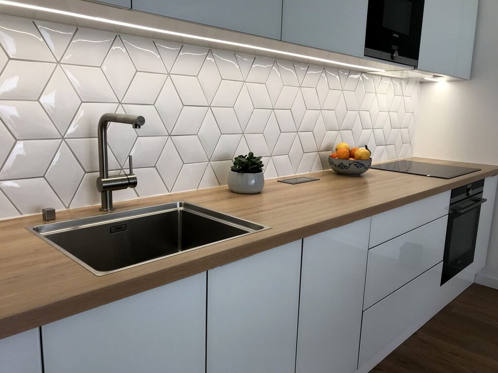 Large tiles for the kitchen backsplash