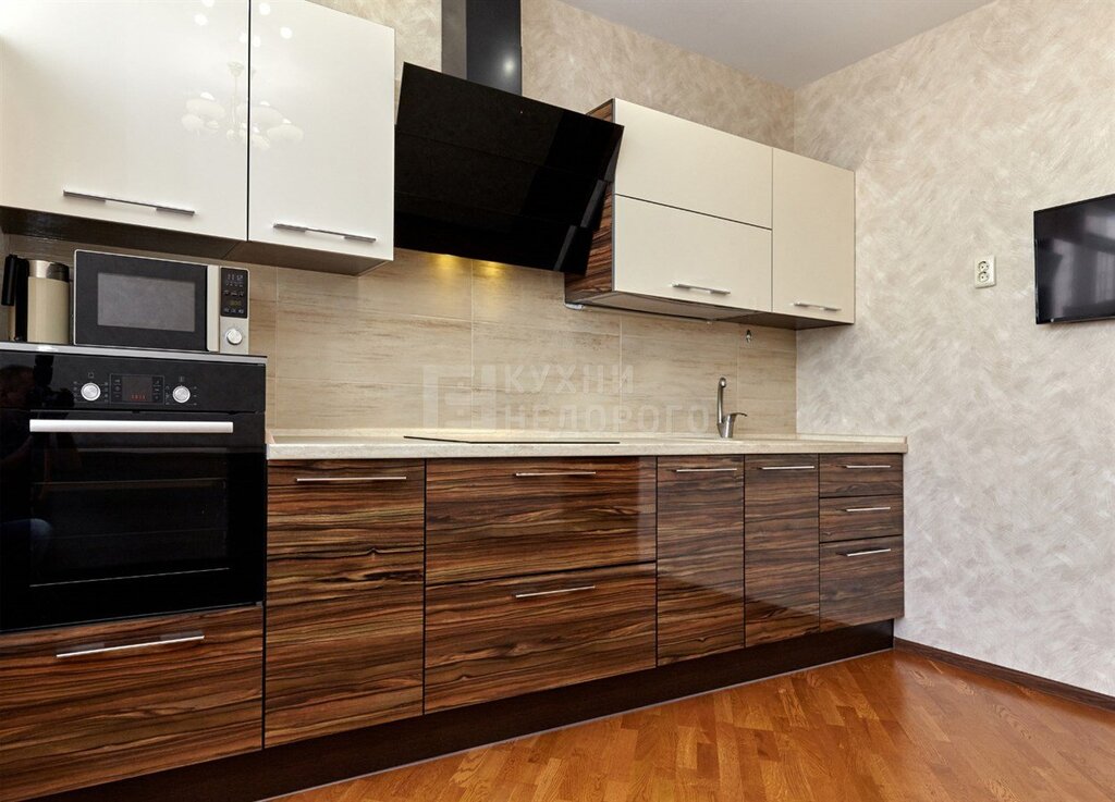 Kitchen with white lower cabinets and wooden upper cabinets