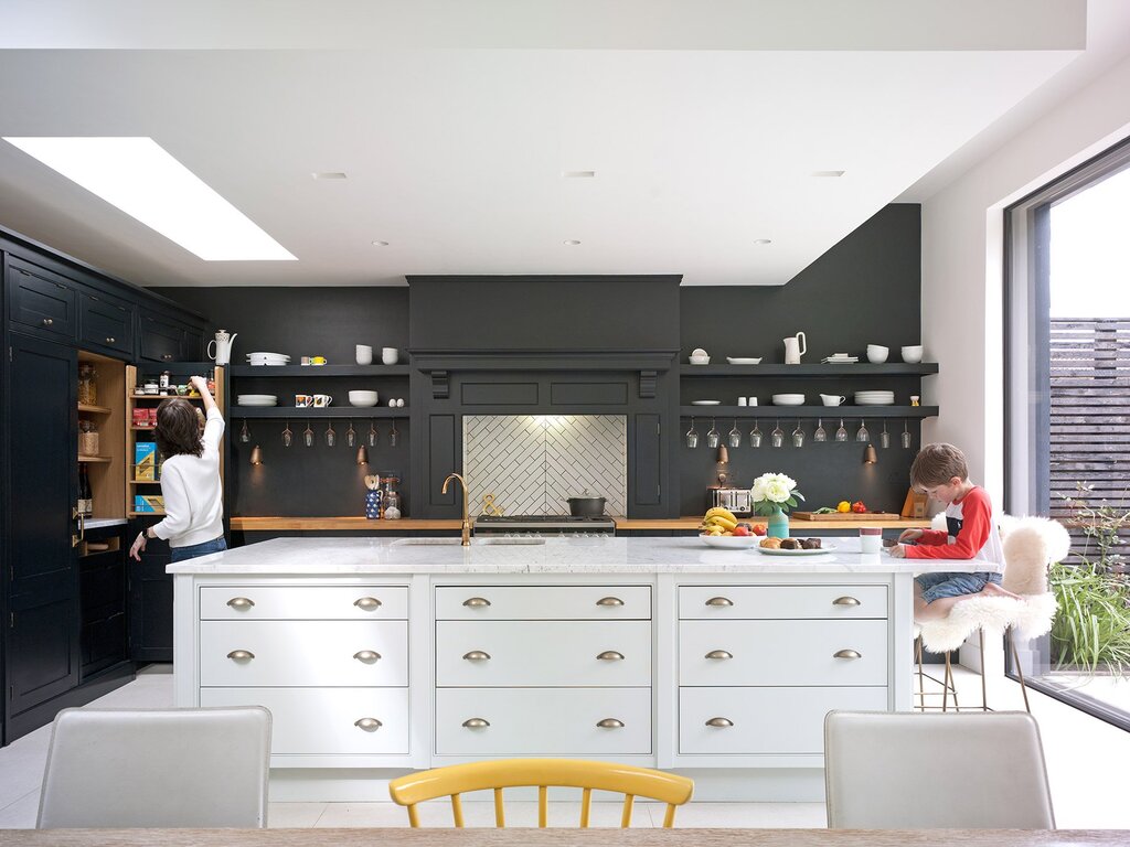 A kitchen without upper cabinets