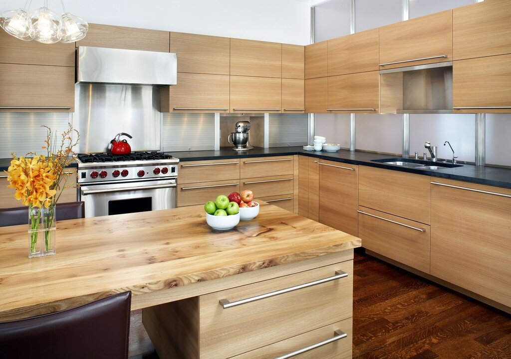 The kitchen is beige with wood