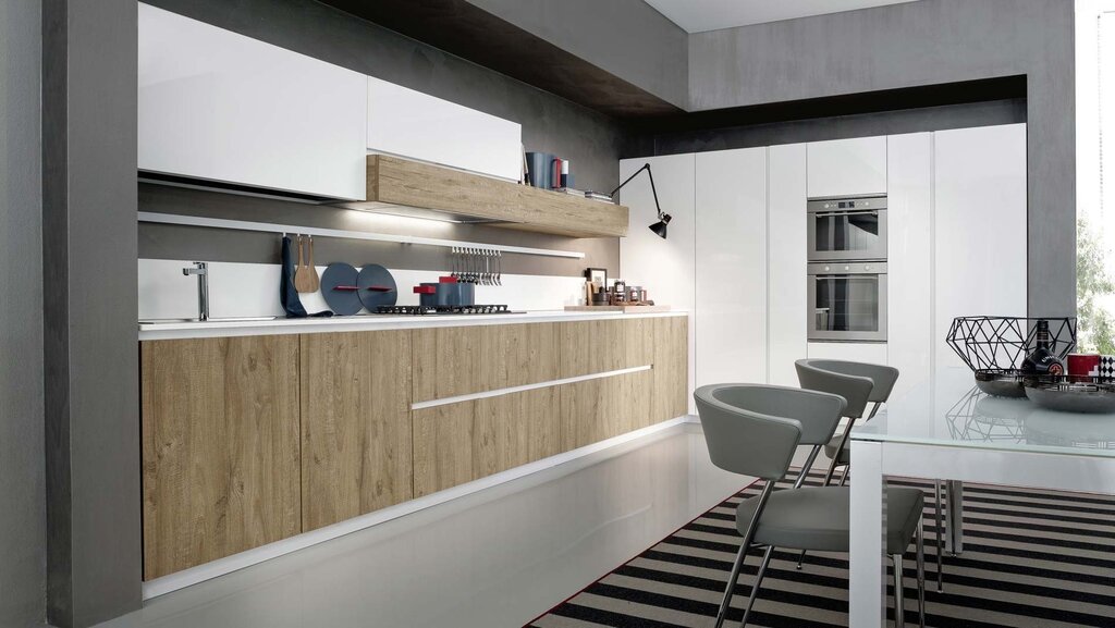 The kitchen is two-level in a modern style