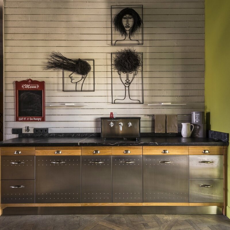 A kitchen made of metal and wood