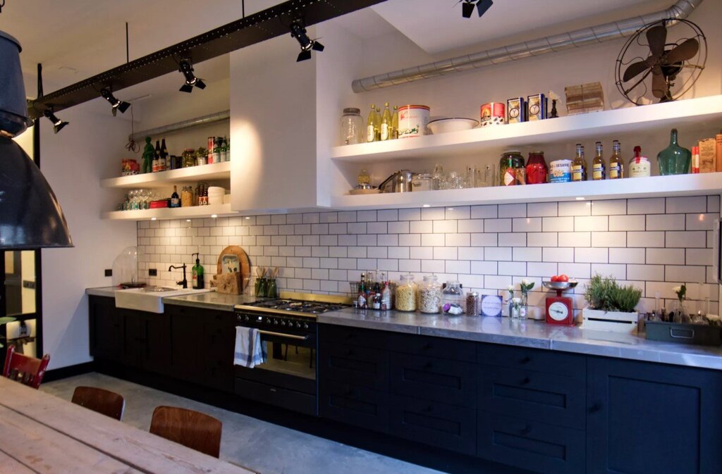 Loft kitchen without upper cabinets