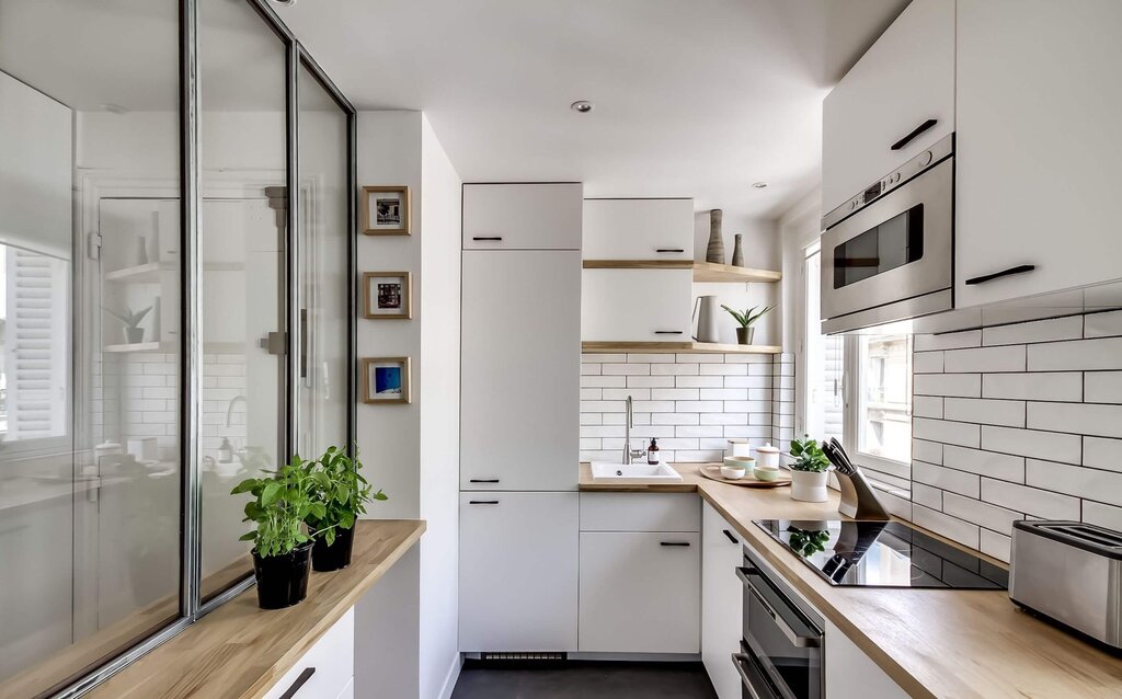 A kitchen on the balcony in a studio apartment