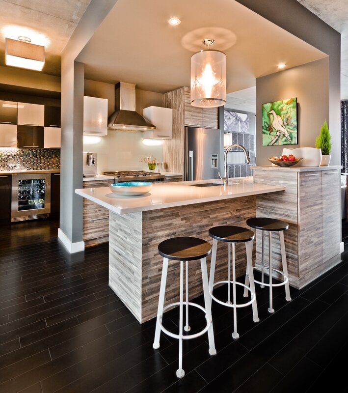 A kitchen transitioning into a living room