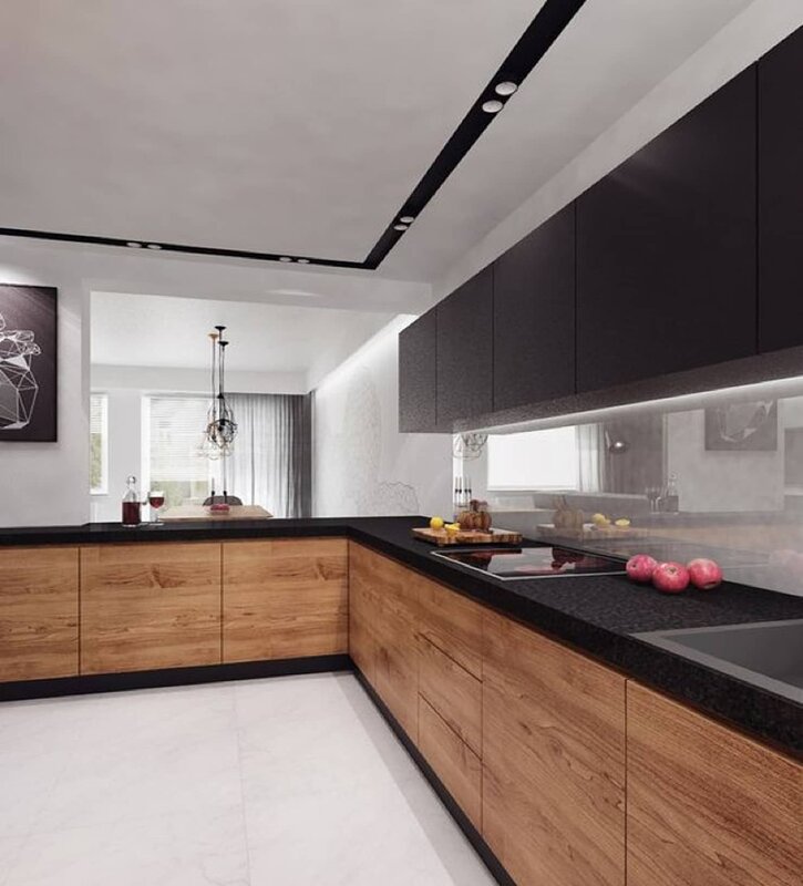 A wooden kitchen with a dark countertop