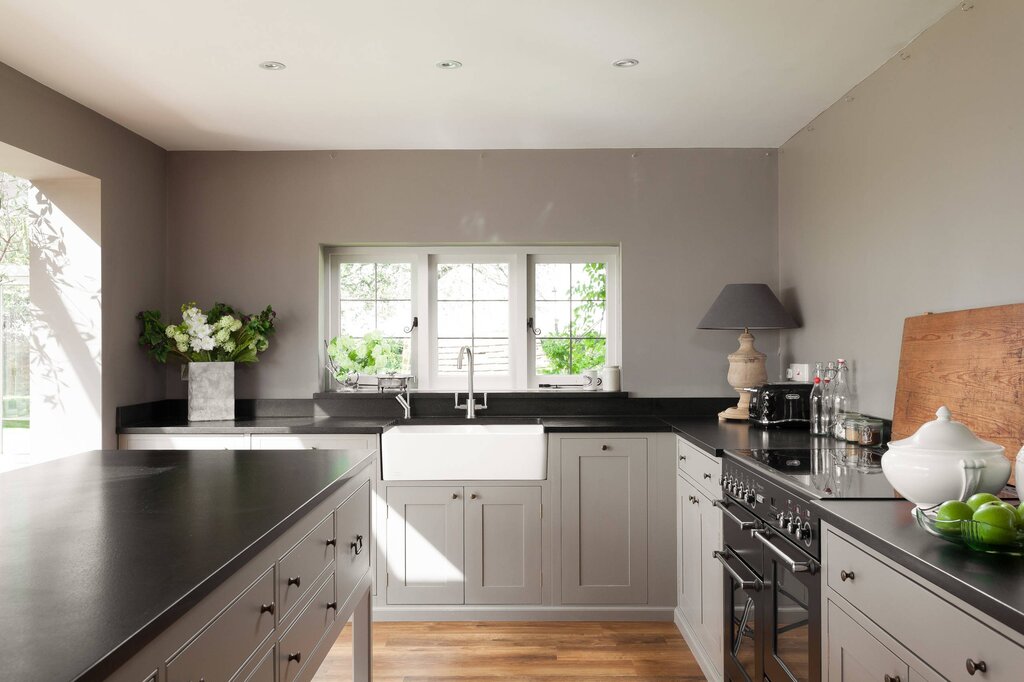 A kitchen against gray walls