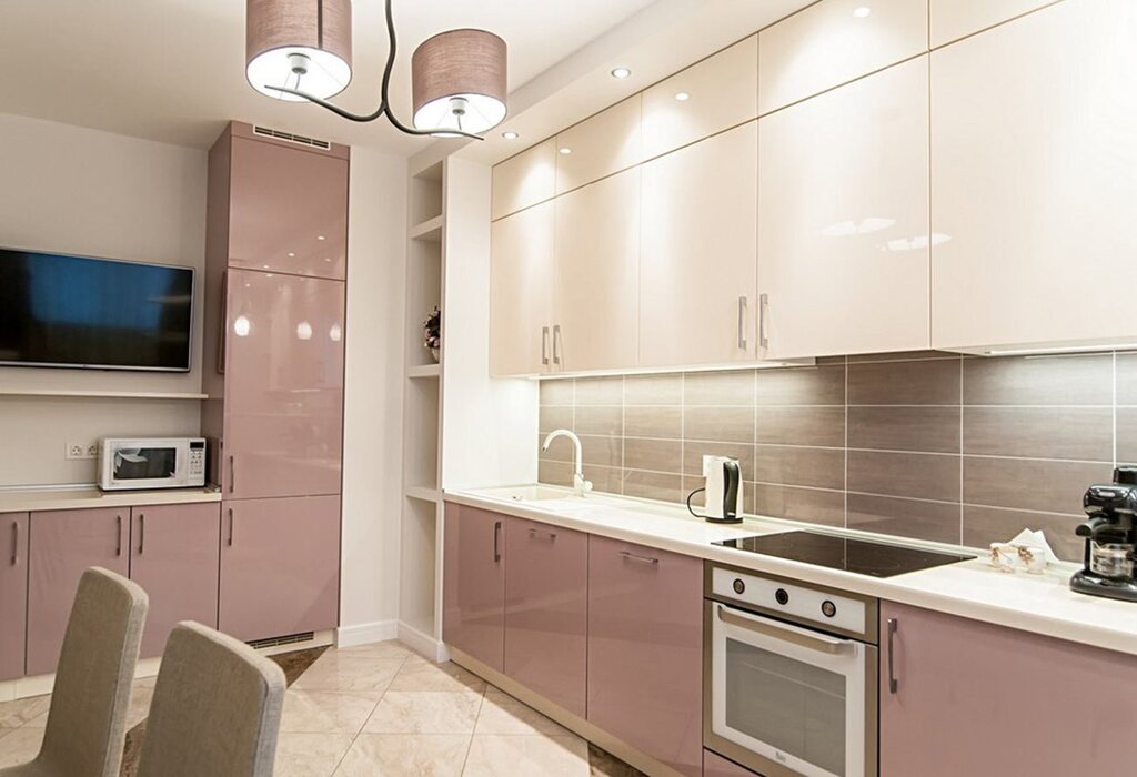 A kitchen with beige fronts