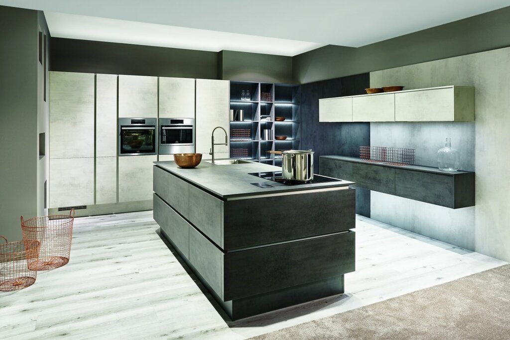 A kitchen with concrete-style fronts