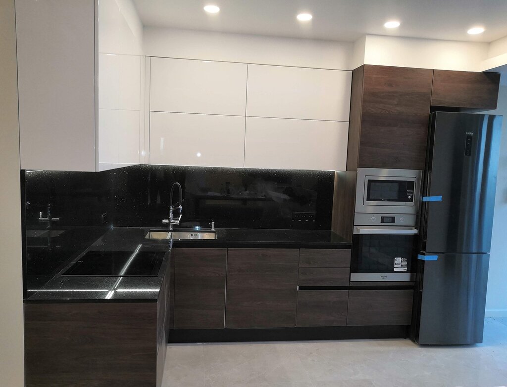 Kitchen with a ventilation duct