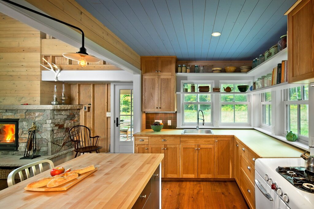 A kitchen with a low ceiling