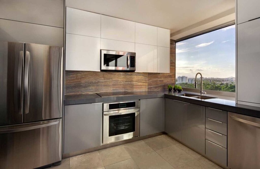 A kitchen with a window in a minimalist style