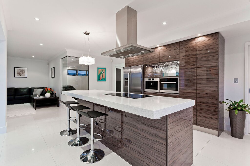 A kitchen with an island in a private house