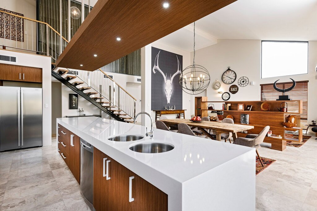 A kitchen with an island in a loft style