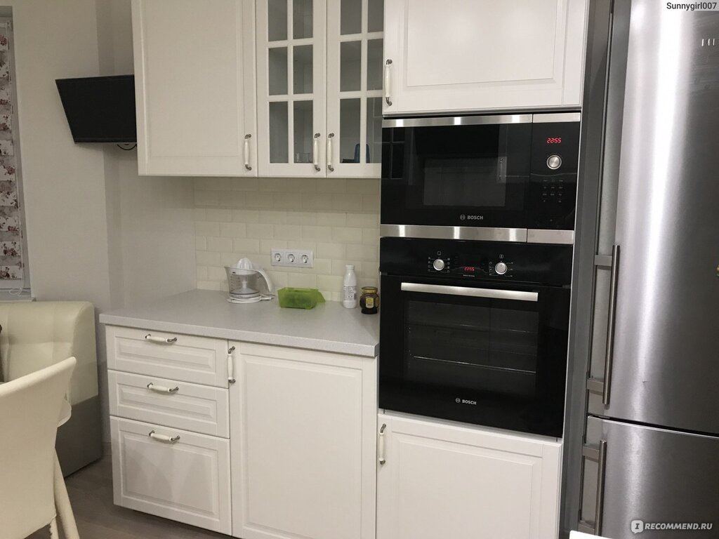 Kitchen with a built-in oven cabinet