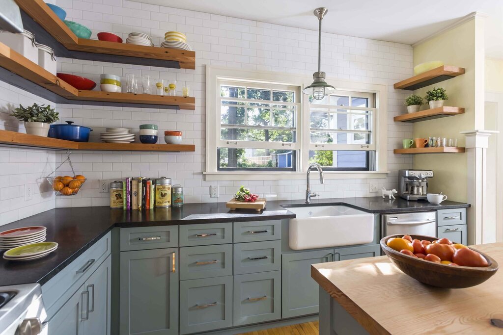 A kitchen with shelves instead of cabinets