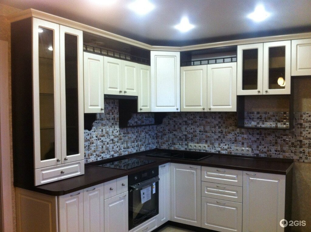 Kitchen with a dark countertop