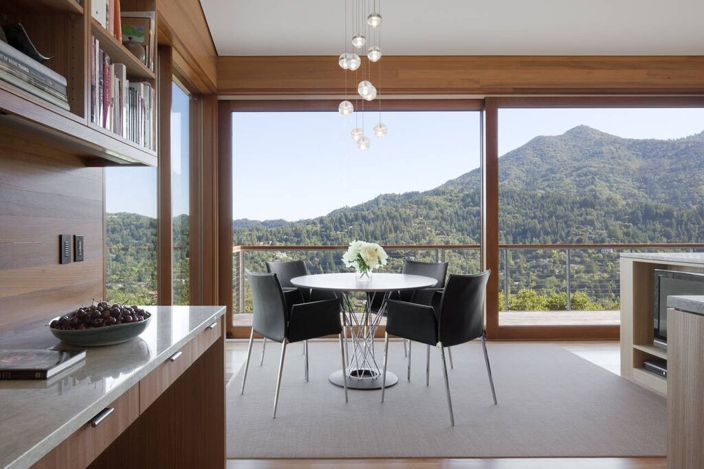 A kitchen with a view of the mountains