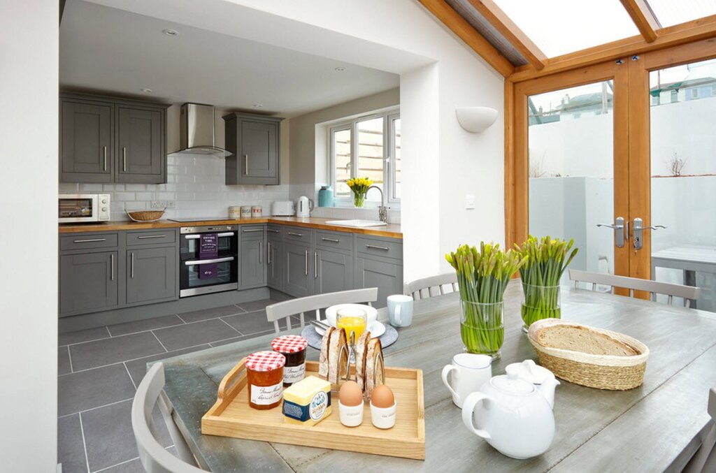 A kitchen with access to the veranda