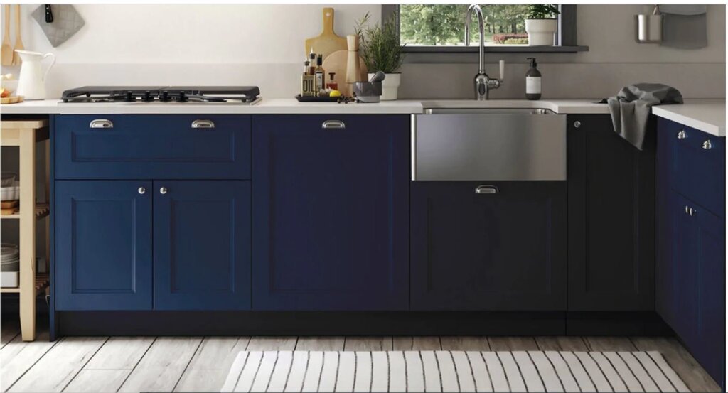 Blue matte kitchen with wood