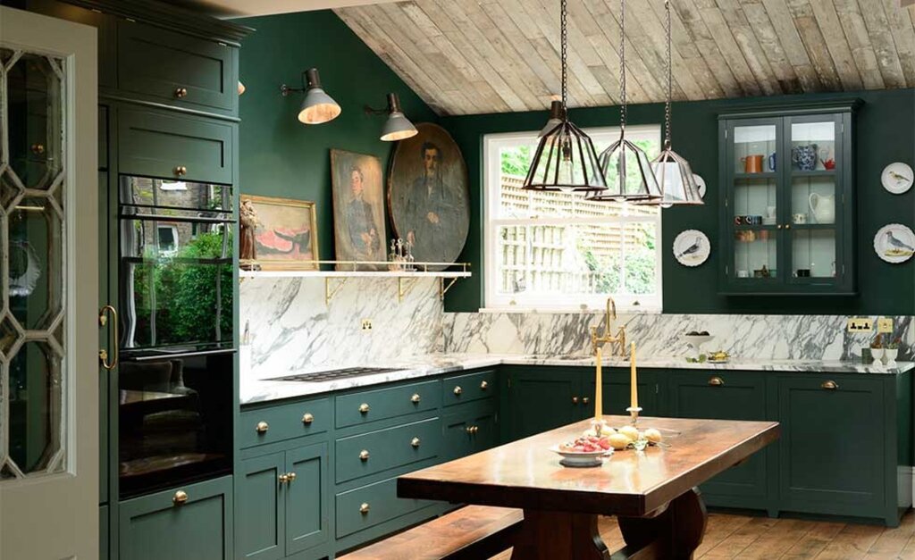 The kitchen is dark green with wood