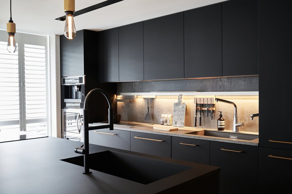 A kitchen in black tones