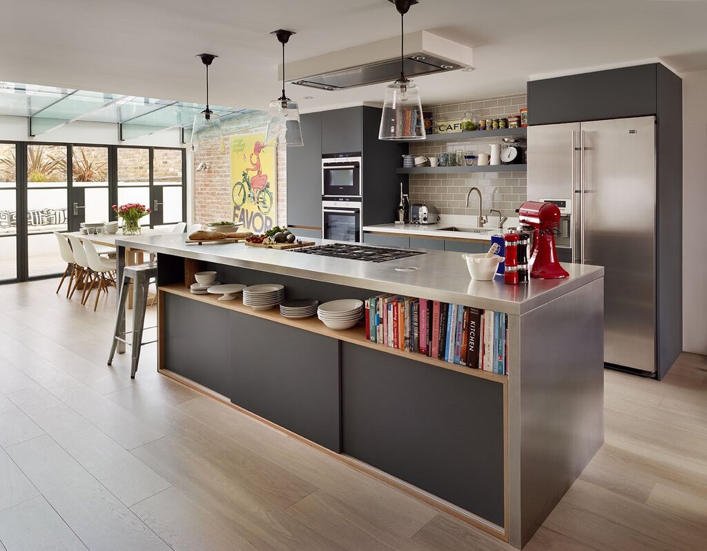 A kitchen in a house with an island