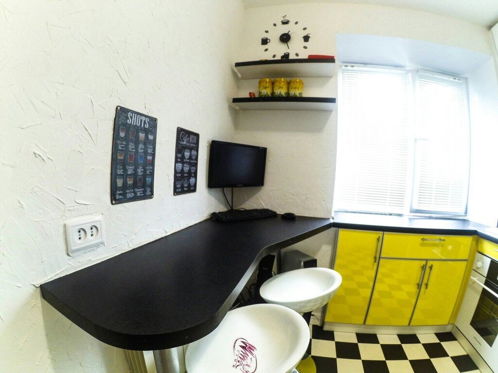 A kitchen in a Khrushchyovka with a bar counter