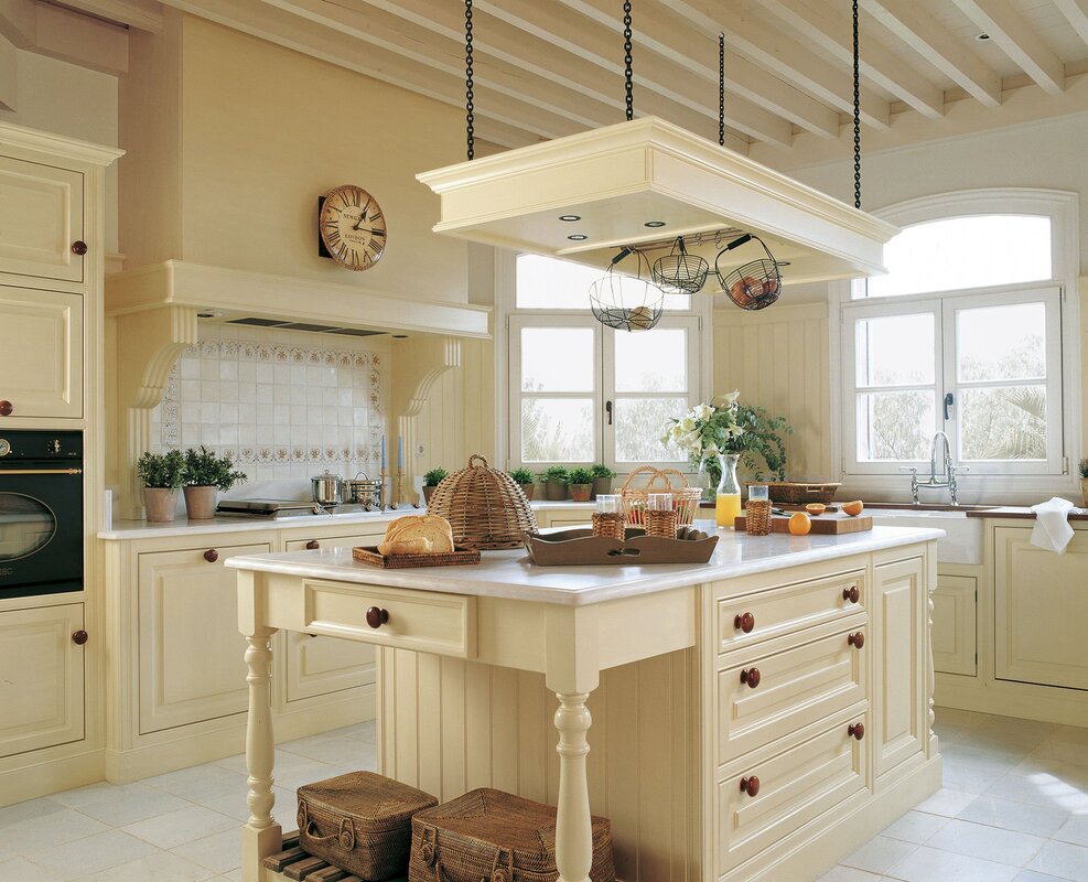 A kitchen in Provence style with an island