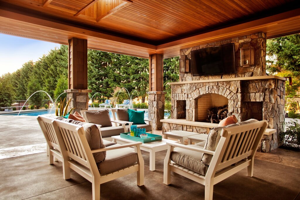 Summer kitchen with a fireplace