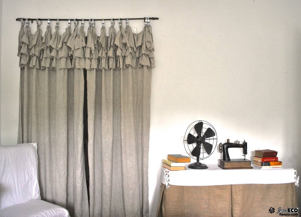 Linen curtains in the living room interior