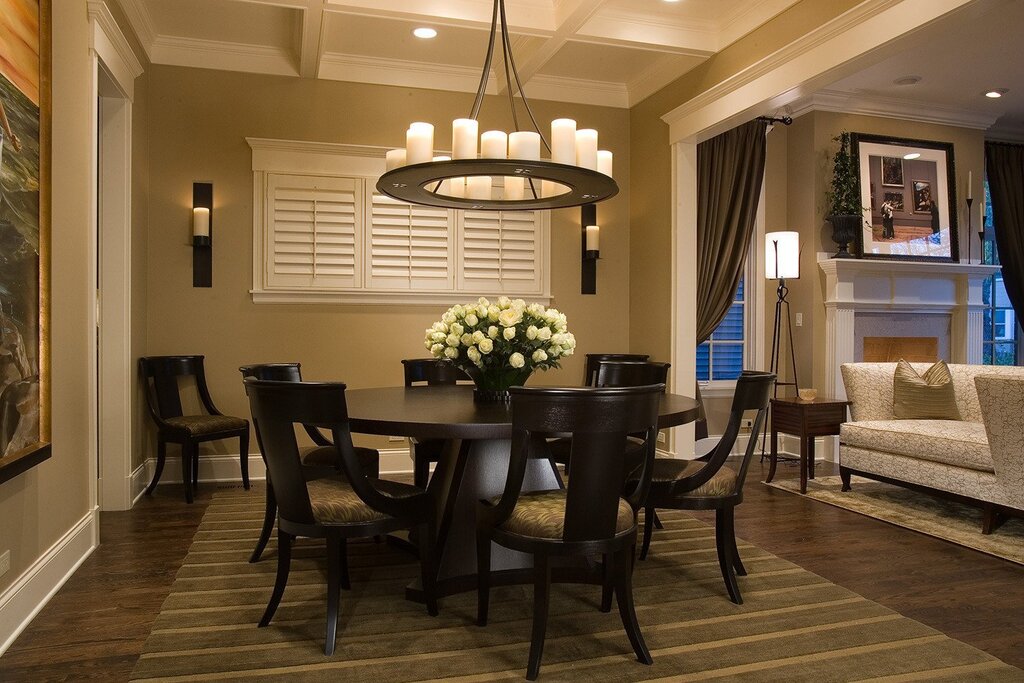 A chandelier above the round table