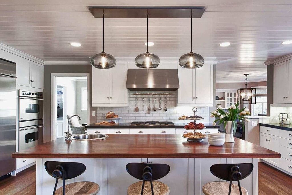 Chandelier above the kitchen island