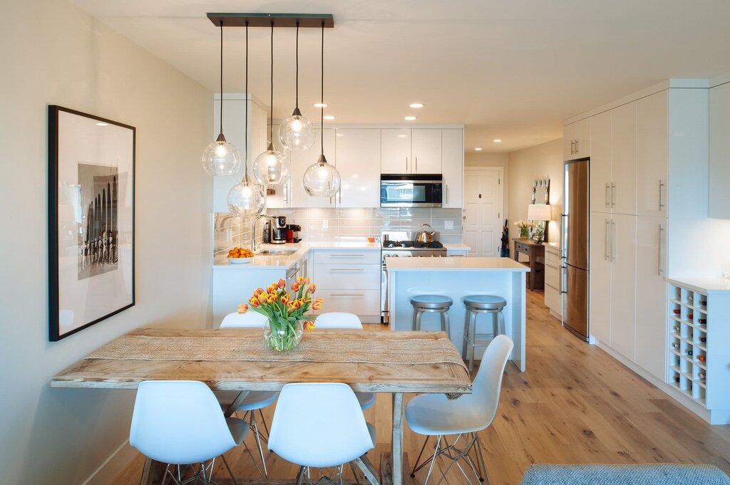 The chandelier above the dining table in the kitchen