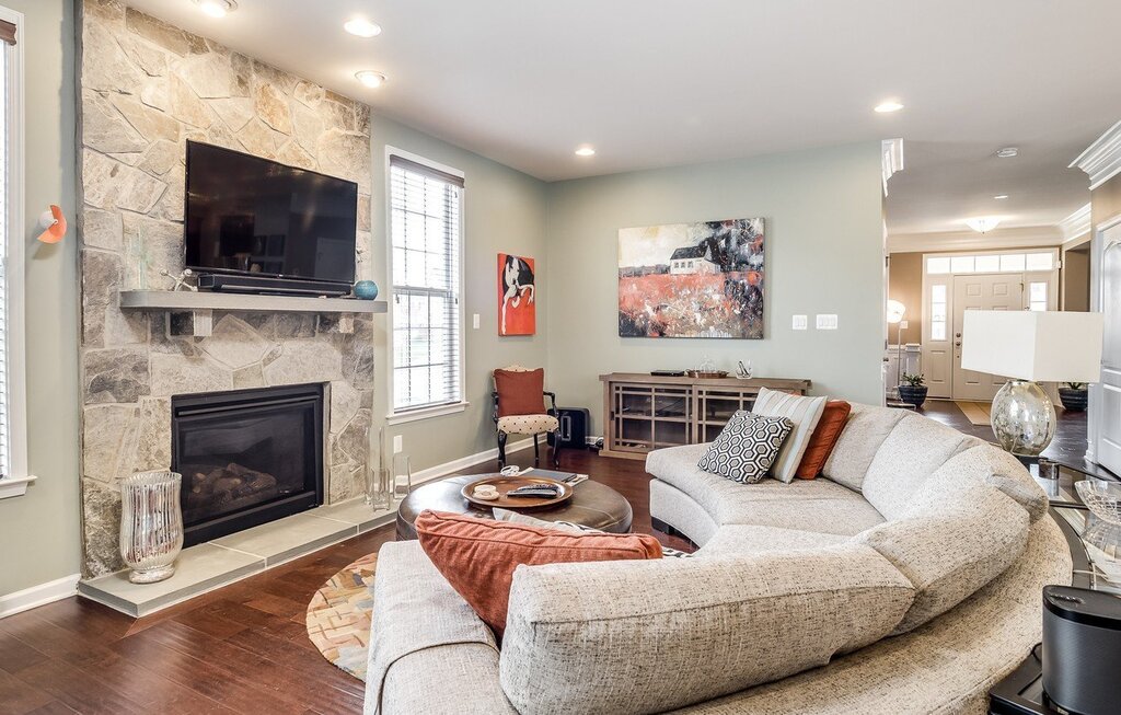 A small living room with a fireplace